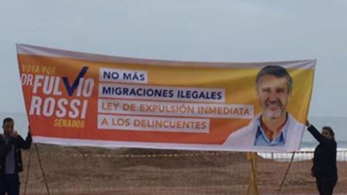 Fulvio Rossi descarta xenofobia en lienzo de campaña donde pide terminar con migraciones ilegales y expulsar a delincuentes