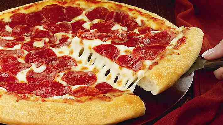 Dos gigantes del mundo de la pizza estudian alianza para crecer en Chile y el mundo