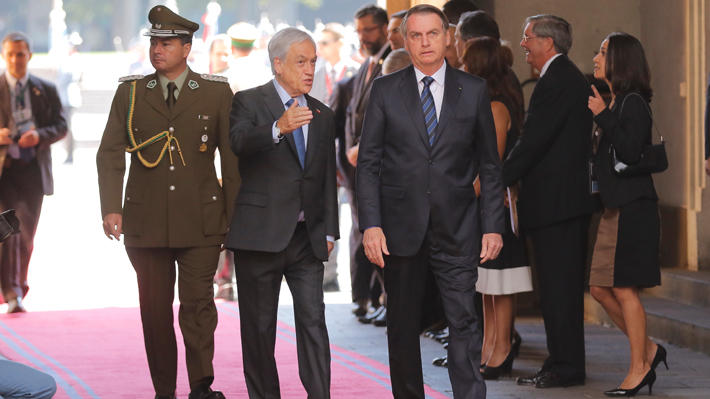 Las agitadas 48 horas de Bolsonaro en Chile: Del rechazo a su visita al apoyo para la "próxima campaña electoral" de Piñera