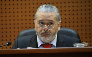 Corte absuelve a juez Urrutia por viajes con licencia pero reprocha: "Es una falta de prudencia al cargo"