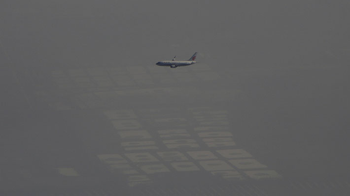 Espesa nube de smog le da un pequeño respiro a Beijing, pero se espera que regrese mañana